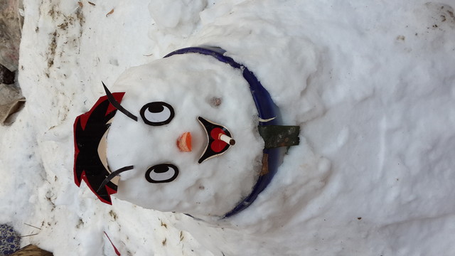 儿子跟外婆的雪雕作品