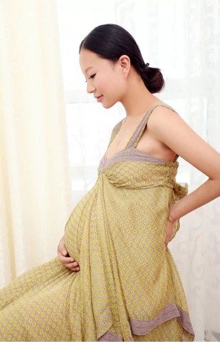 今天选孕妇照,我的肚子也真的是看醉了,猜猜几个月