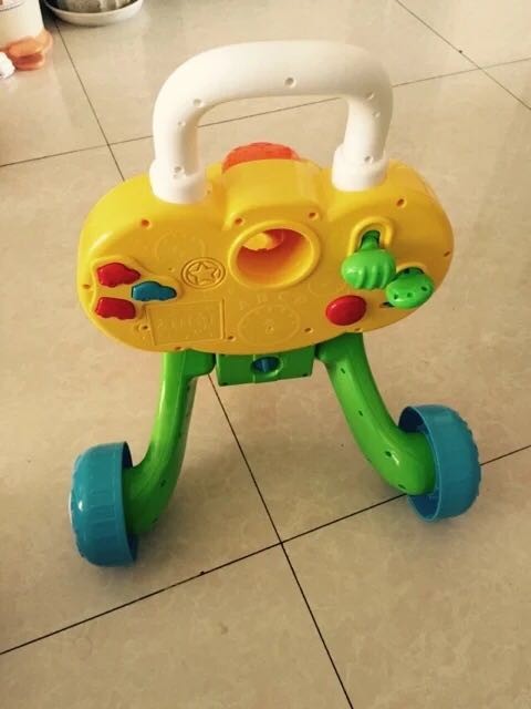 转让九九成新澳贝学步车